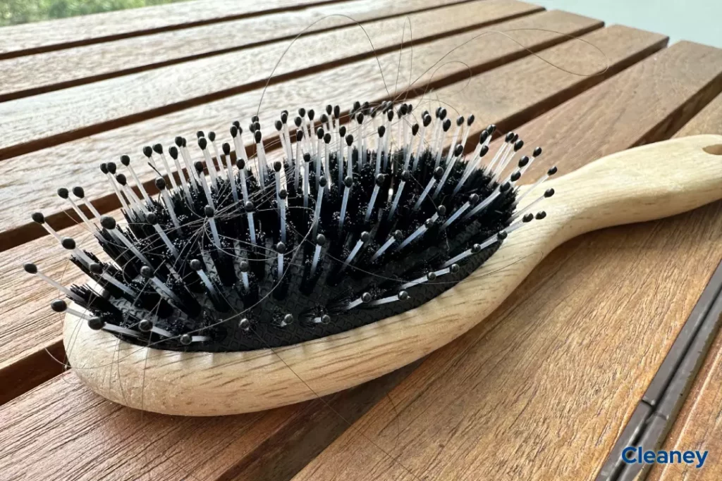 remove hair from wooden hairbrush